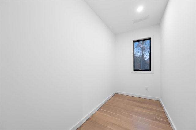 spare room with light hardwood / wood-style floors