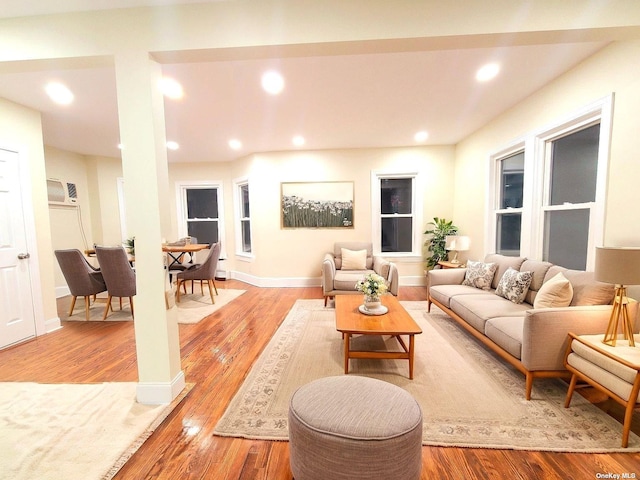 living room with light hardwood / wood-style flooring