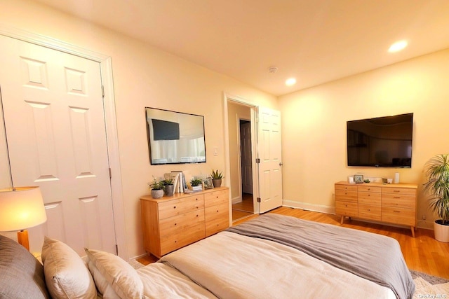 bedroom featuring light hardwood / wood-style flooring