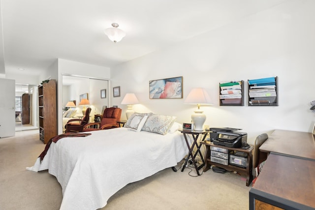 carpeted bedroom with a closet