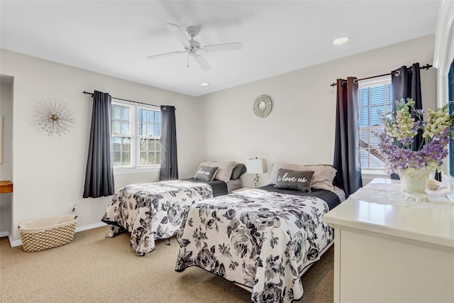 bedroom with ceiling fan and carpet floors