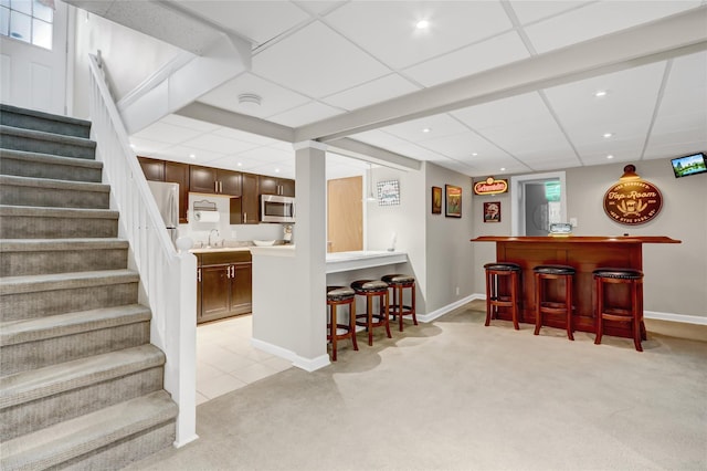 interior space with light colored carpet and sink