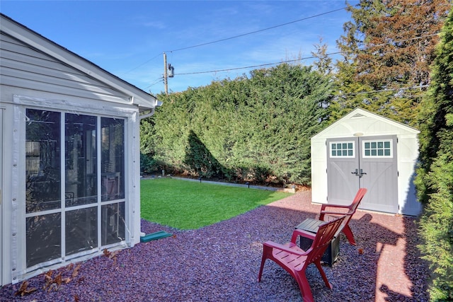 view of yard with a storage unit