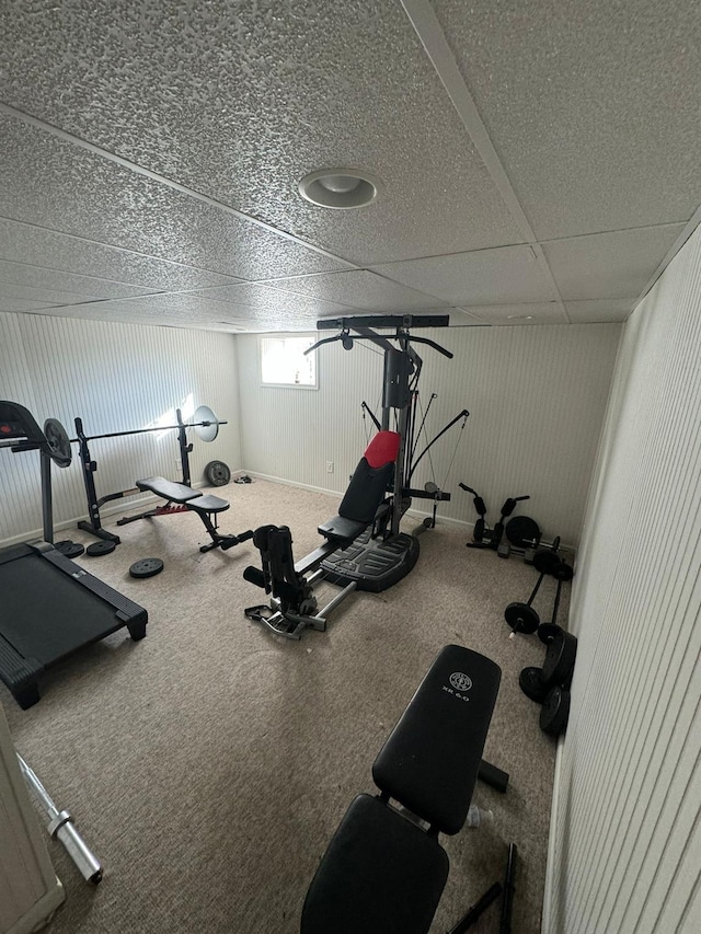 workout area with a drop ceiling