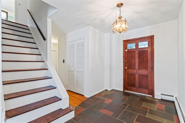 entryway with a notable chandelier