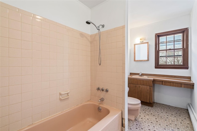 full bathroom featuring vanity, toilet, and tiled shower / bath