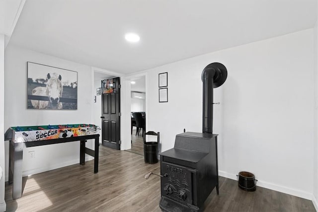 game room featuring dark hardwood / wood-style floors