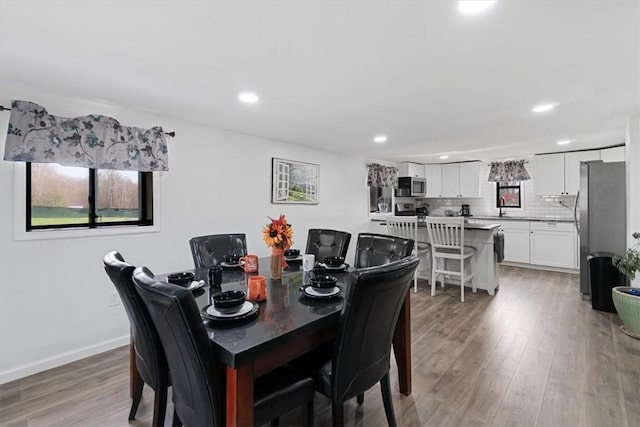 dining room featuring hardwood / wood-style floors