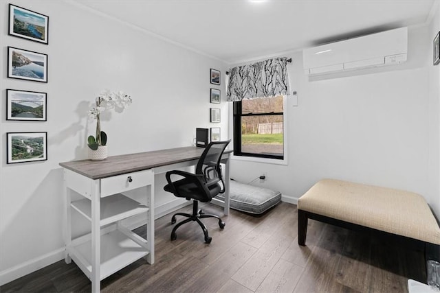 office space with a wall mounted AC and dark hardwood / wood-style floors