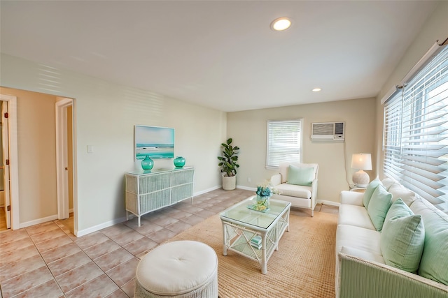 living room with light tile patterned floors and a wall mounted AC