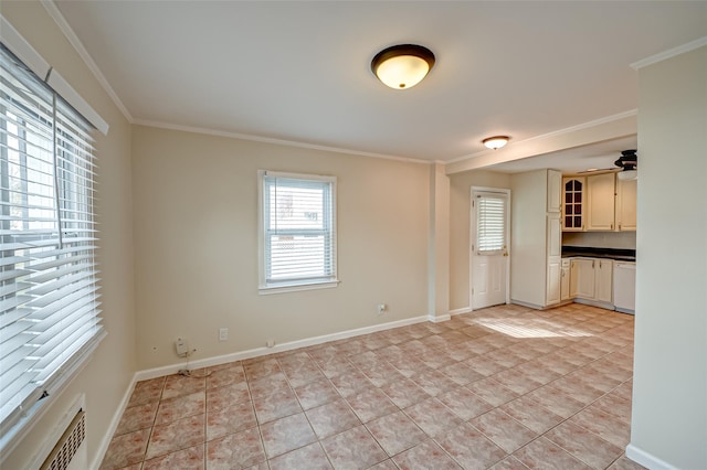 interior space featuring ceiling fan and ornamental molding