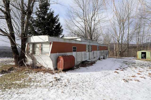 view of snow covered property