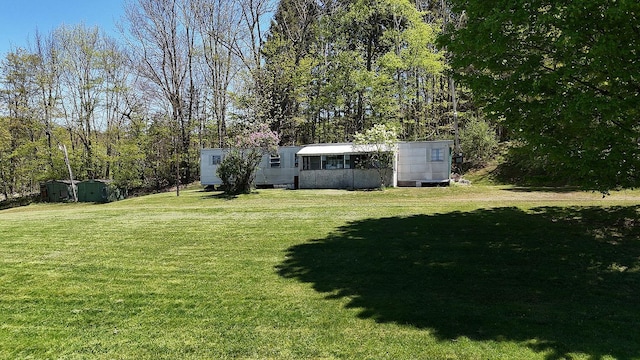 23 Peters Rd, Fremont, NY 12723 - view of green lawn featuring a storage shed and an outdoor structure