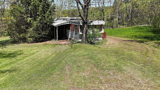 23 Peters Rd, Fremont, NY 12723 - view of grassy yard with an outdoor structure and a wooded view