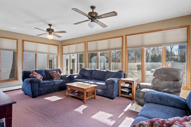 carpeted living room with a baseboard heating unit and ceiling fan