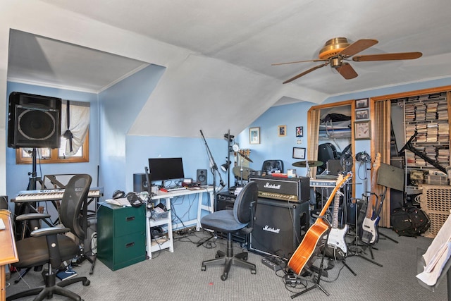 office with ceiling fan, carpet floors, and vaulted ceiling