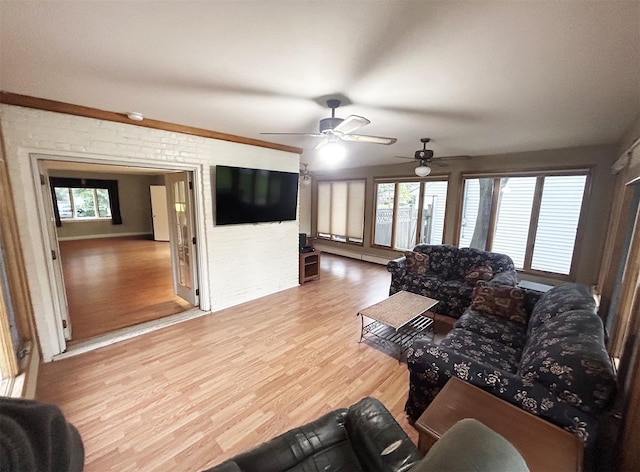 82 Ketewamoke Ave, Babylon, NY 11702 - living room with wood finished floors and a ceiling fan