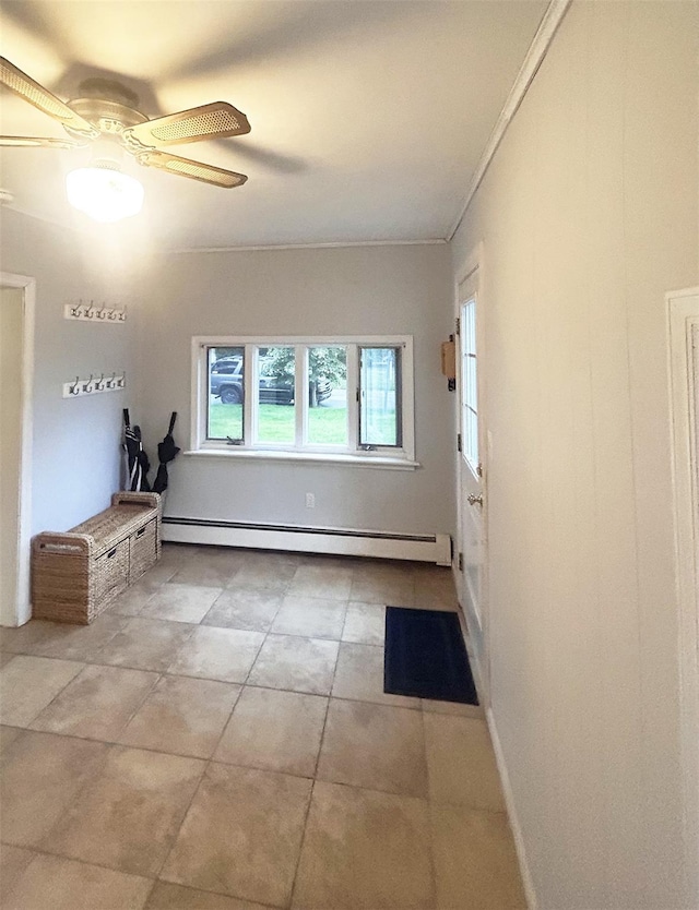 82 Ketewamoke Ave, Babylon, NY 11702 - tiled spare room with a baseboard heating unit and ceiling fan