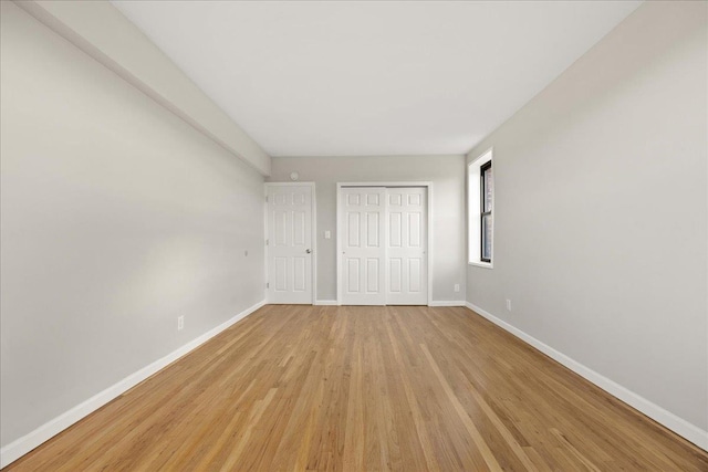 unfurnished bedroom featuring light hardwood / wood-style floors