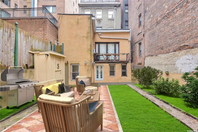 back of house featuring an outdoor hangout area