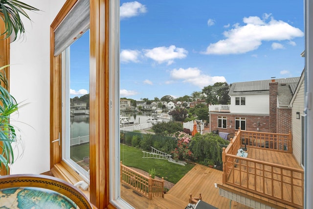 balcony featuring a water view