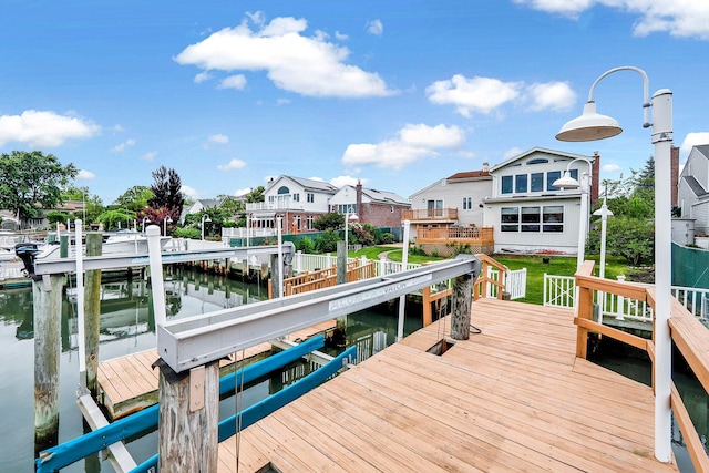 dock area with a water view