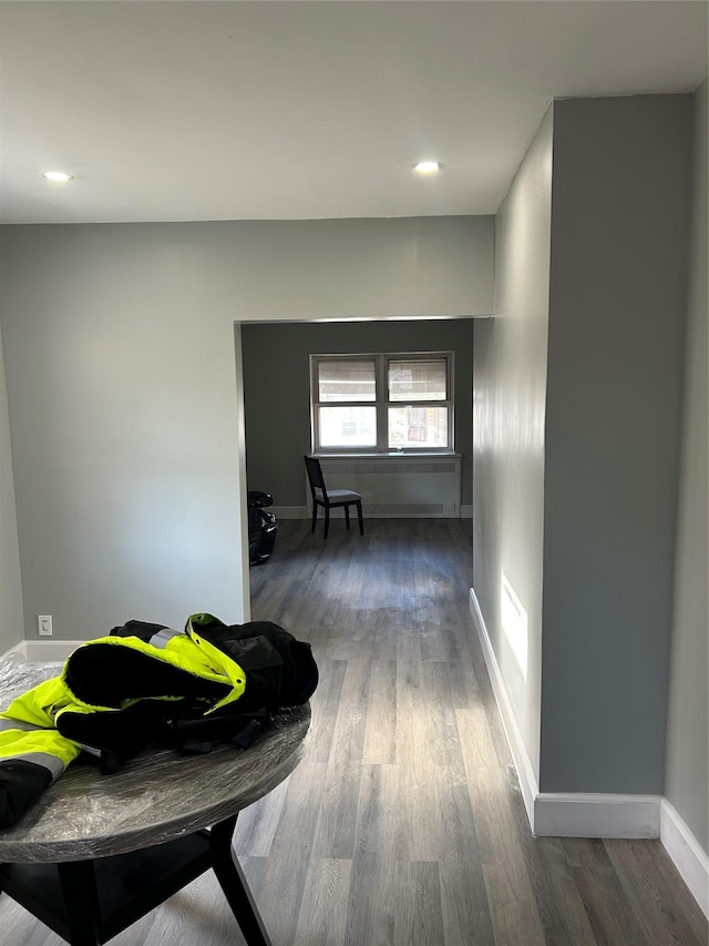 hallway with dark wood-type flooring