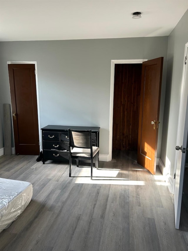 bedroom with light wood-type flooring