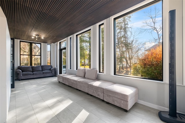 sunroom / solarium with wooden ceiling and plenty of natural light