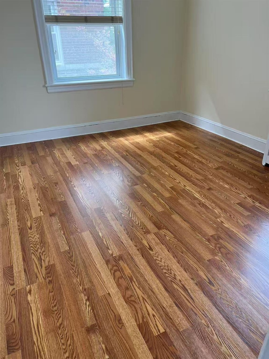 spare room featuring hardwood / wood-style floors