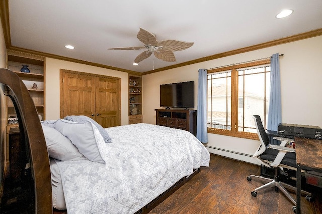 bedroom featuring ornamental molding, ceiling fan, a baseboard heating unit, and dark hardwood / wood-style flooring