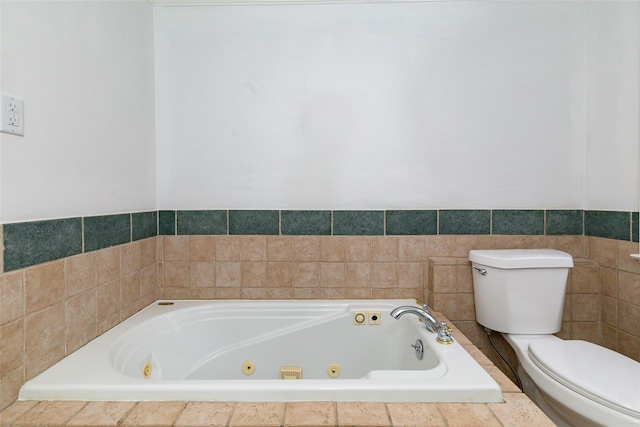 bathroom with tiled bath and toilet