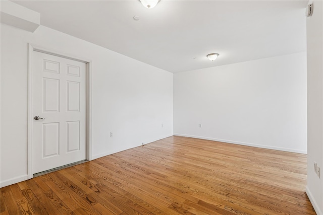 empty room featuring light hardwood / wood-style floors