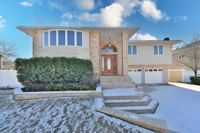 view of front of property featuring a garage