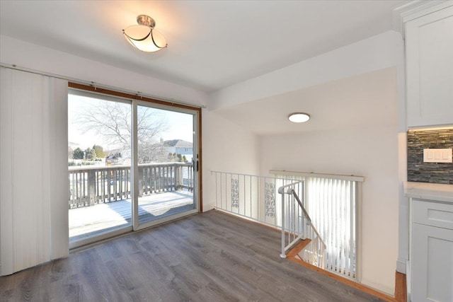 unfurnished room featuring dark hardwood / wood-style floors