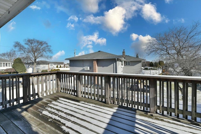 view of snow covered deck