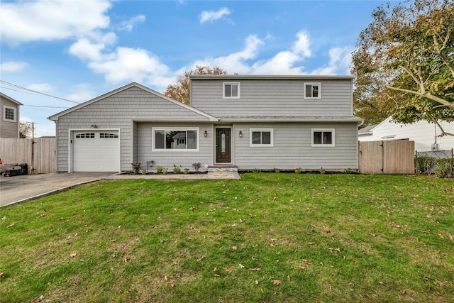 front of property with a front yard and a garage