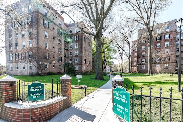 surrounding community featuring a yard