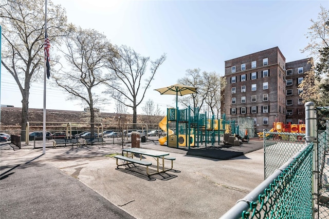 view of home's community featuring a playground