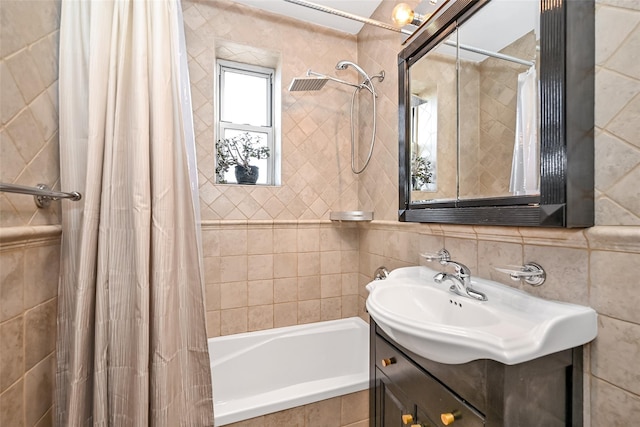 bathroom with shower / tub combo, vanity, and decorative backsplash