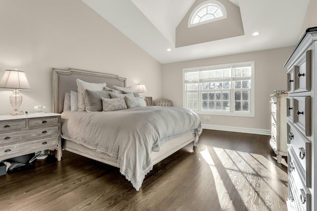 bedroom featuring vaulted ceiling and dark wood-type flooring