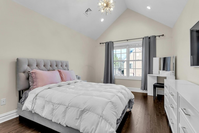 bedroom with an inviting chandelier, dark hardwood / wood-style floors, and vaulted ceiling