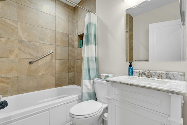 full bathroom with shower / bath combo, vanity, and toilet