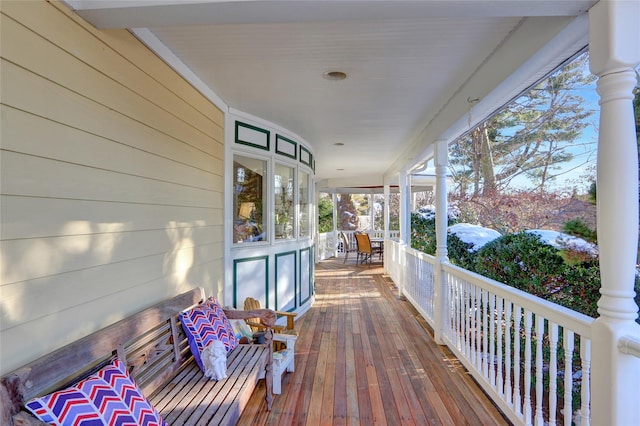 wooden deck featuring a porch