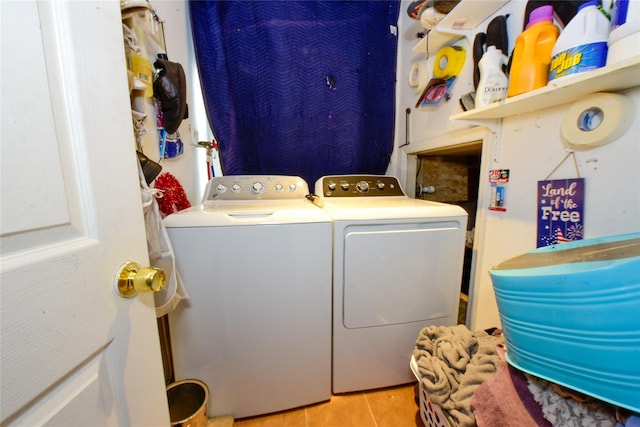 laundry area with separate washer and dryer