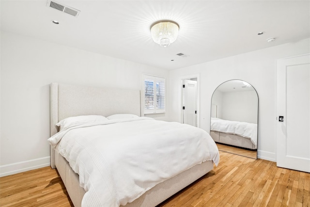 bedroom featuring light hardwood / wood-style floors