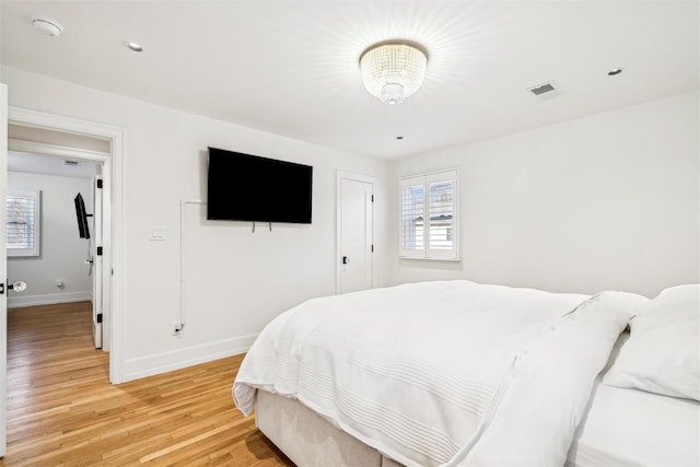 bedroom featuring hardwood / wood-style floors