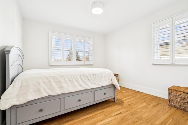 bedroom featuring light wood-type flooring