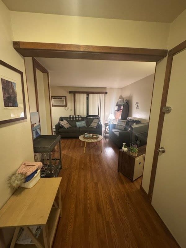 hallway with dark wood-type flooring