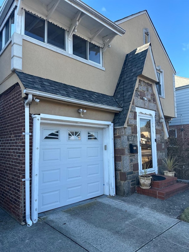 view of front of home with a garage